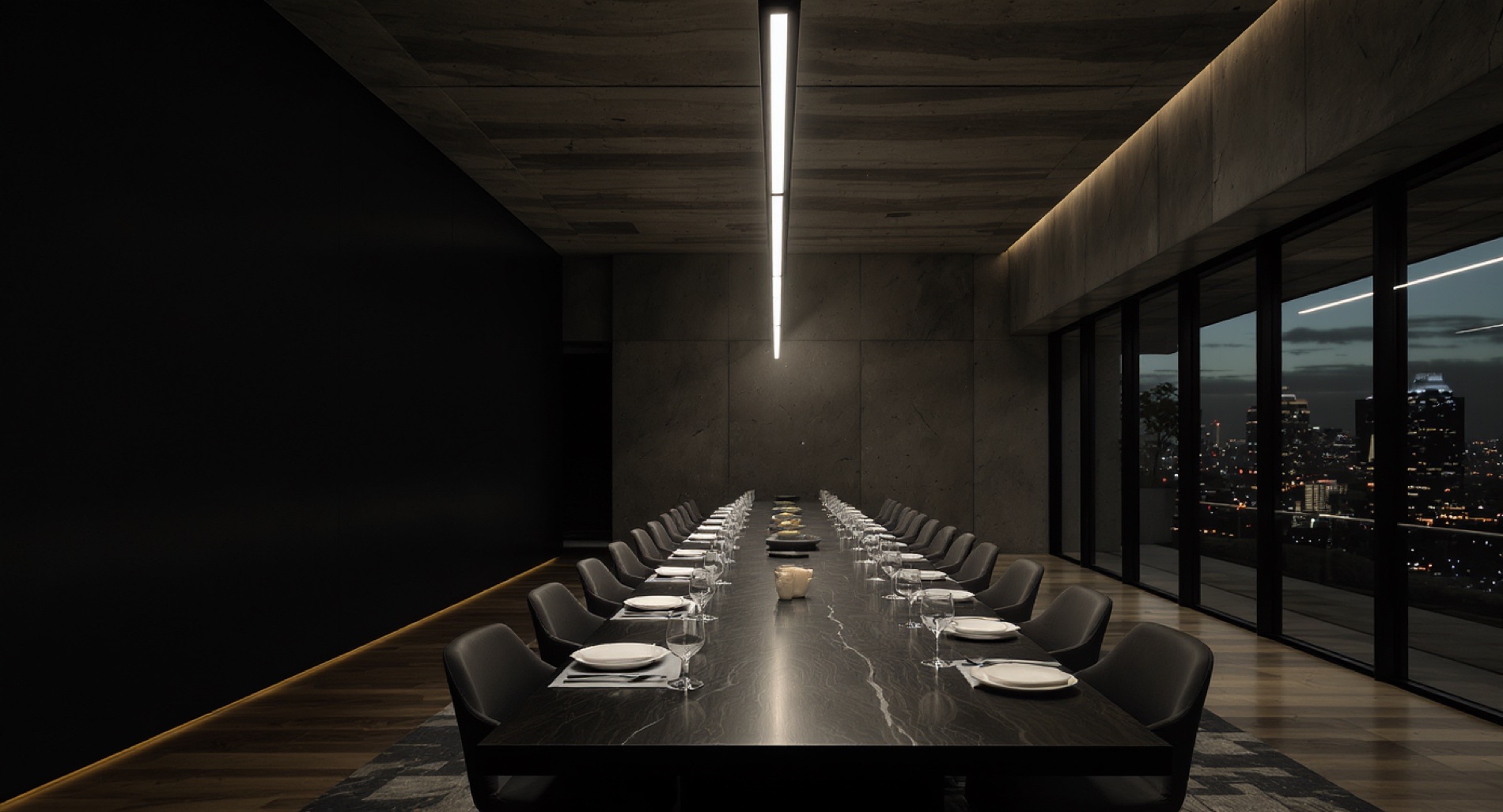 A long private dining table set for fifteen, city lights beyond the glass.